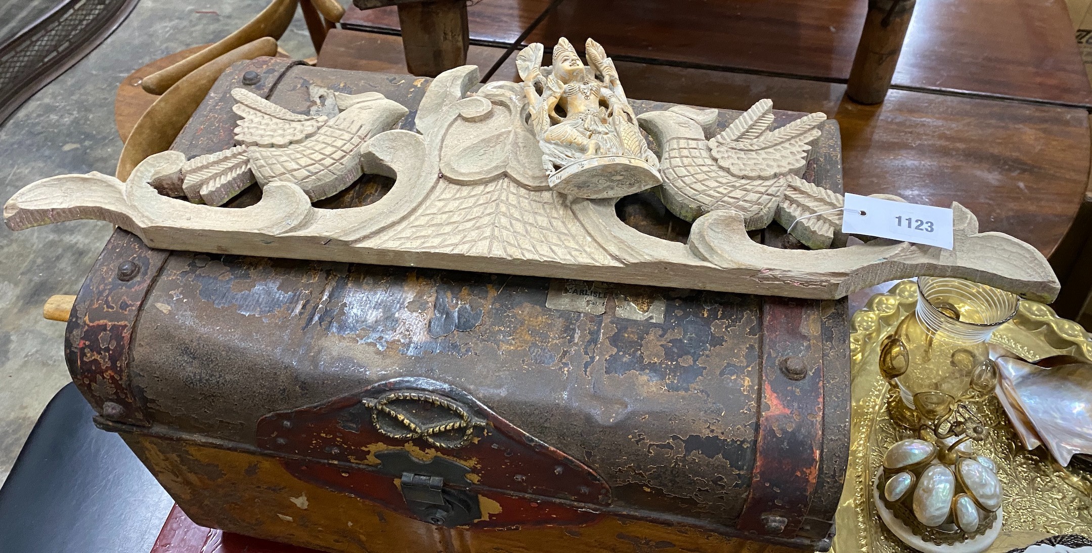 A Victorian tin trunk, a painted leather banner, an oval Indian brass tray and sundries.